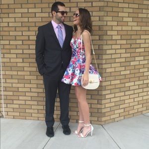 A flowery, flare dress *ONLY WORN ONCE*